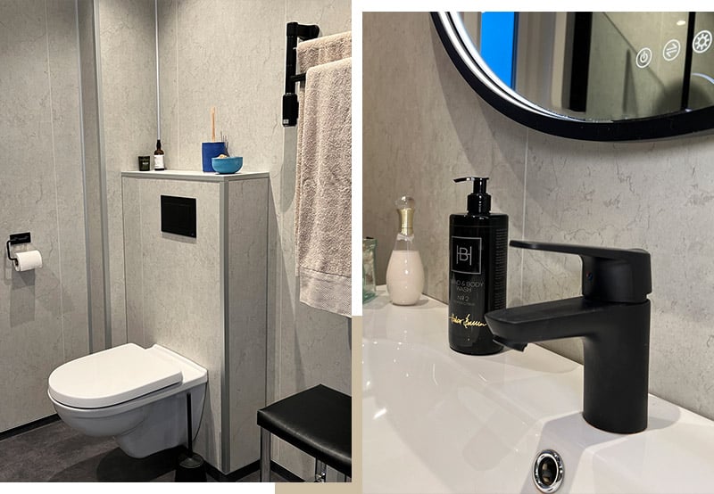 Sorte detaljer på badet med Oras Vega servantbatteri og Tece betjeningsplate